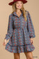 Collared neckline button down floral print dress with crochet trimmed details